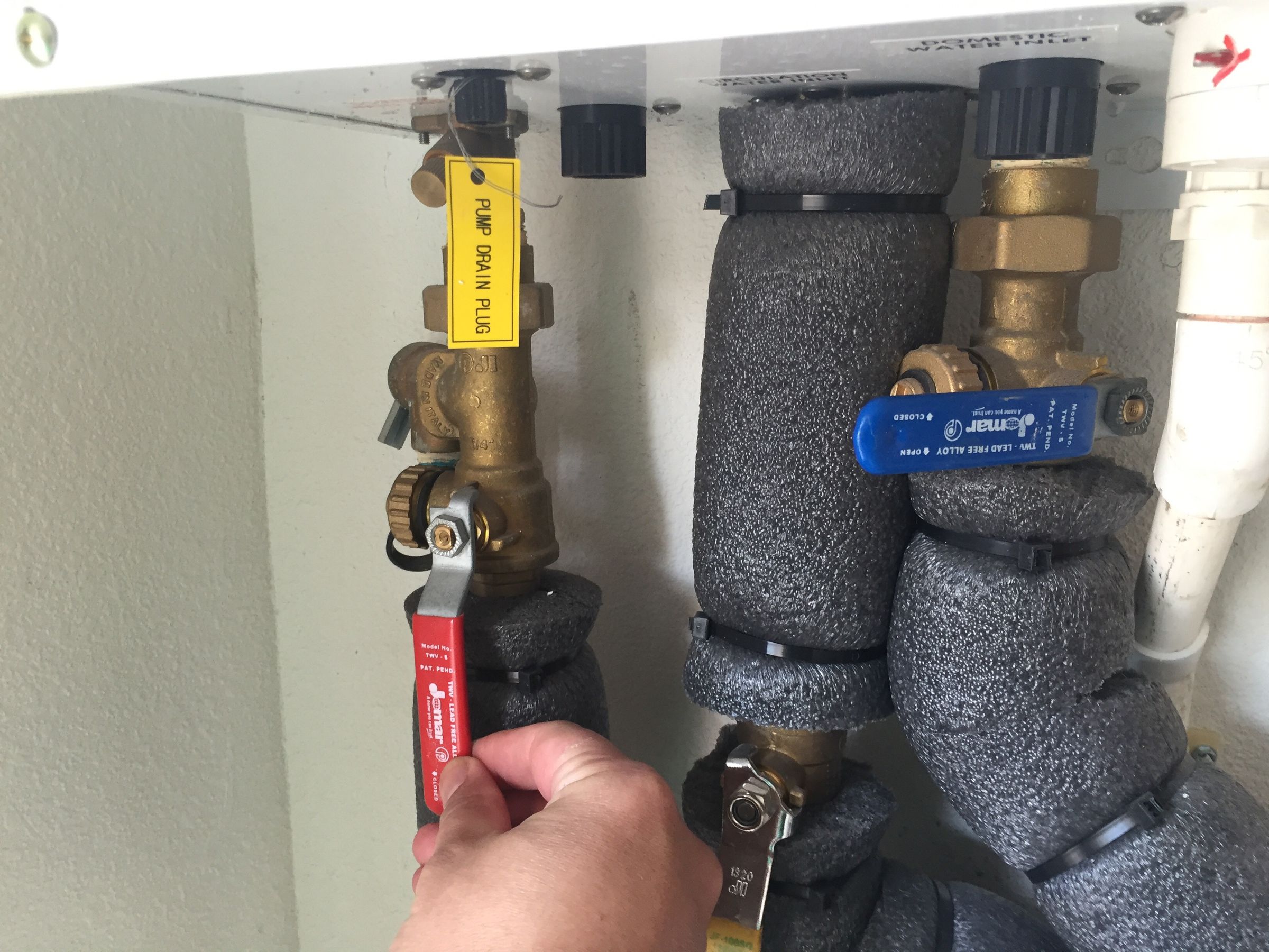 How to Flush a Tankless Water Heater and Clean the Air Intake Filter