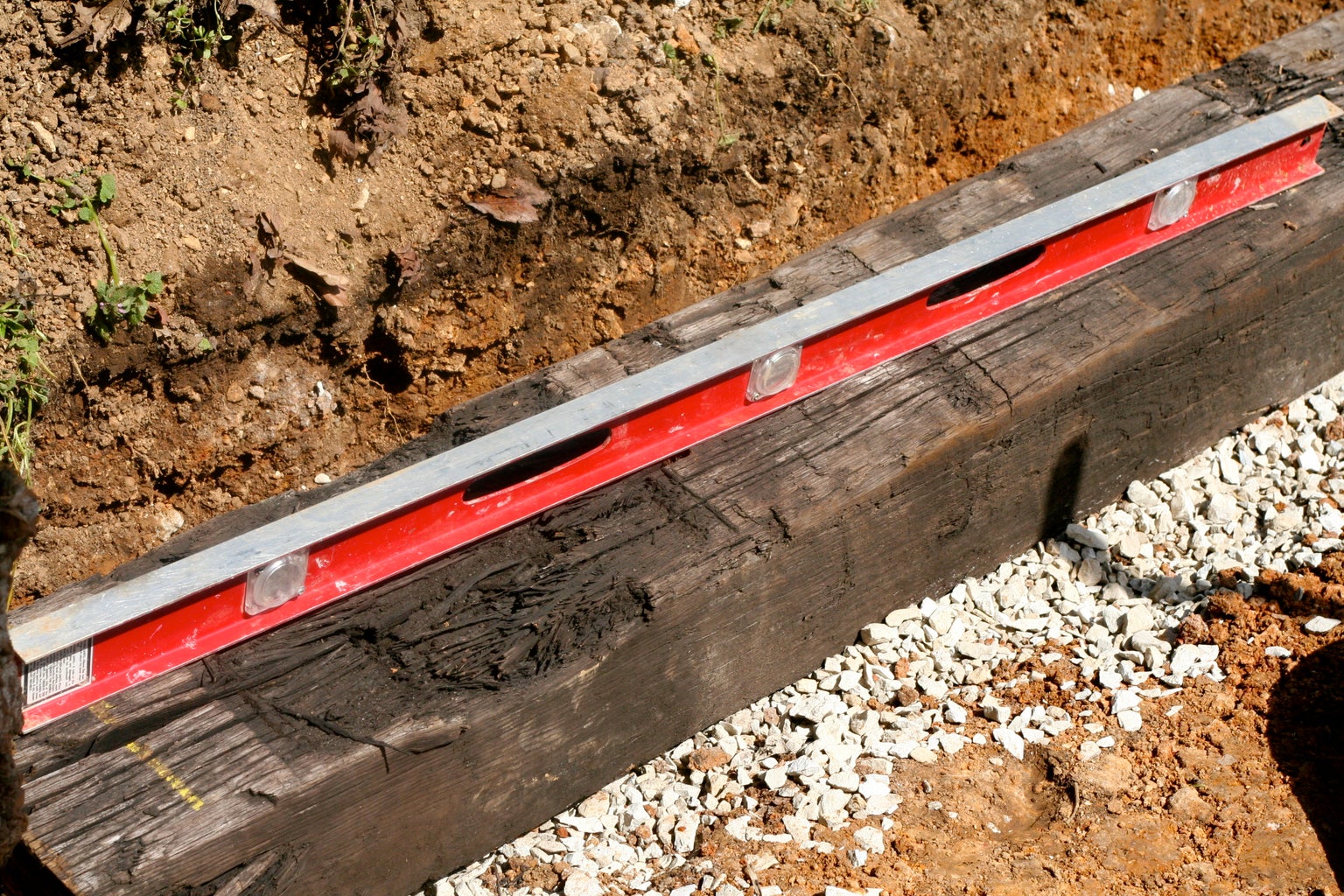 How to Build a Railroad Tie Retaining Wall 10 Steps (with Pictures