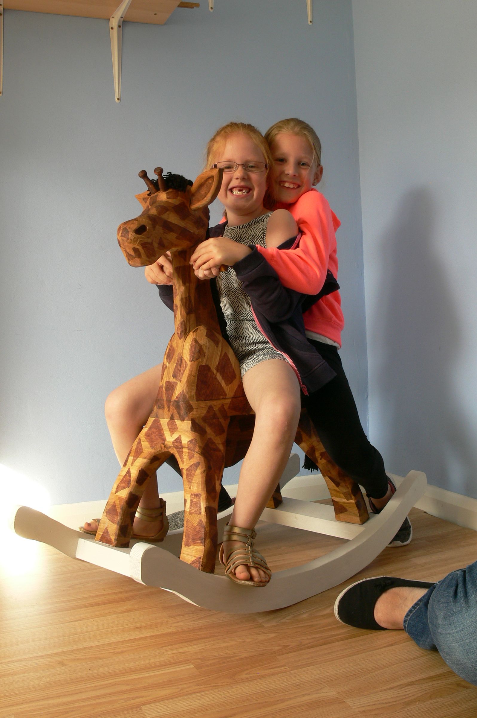 wooden giraffe rocking horse