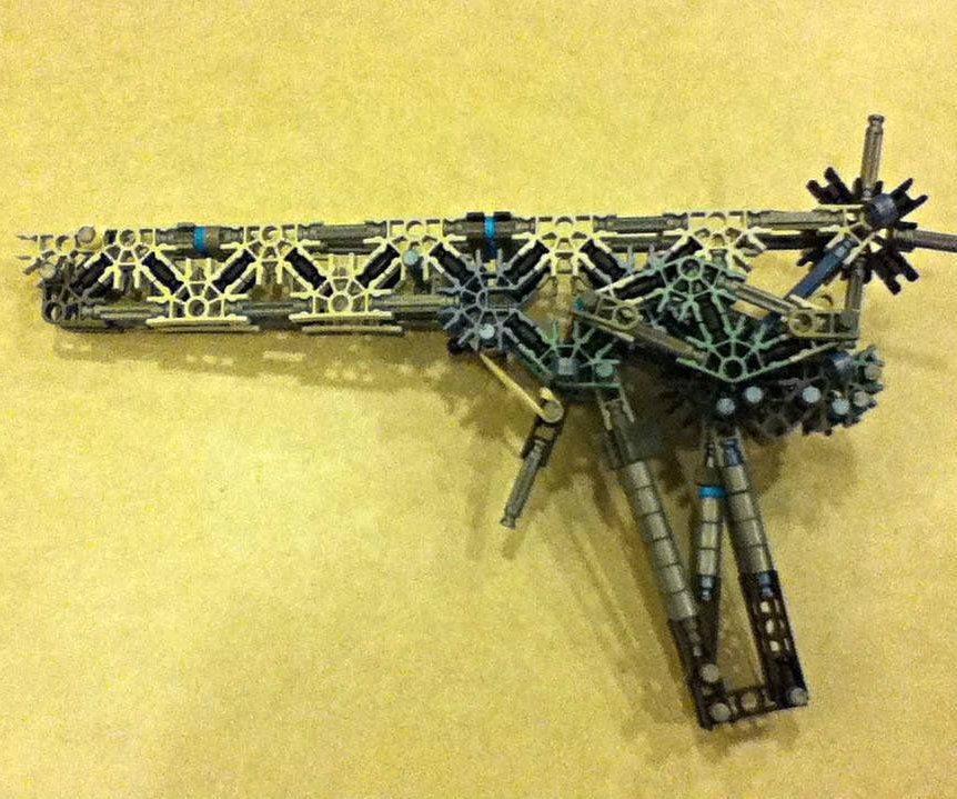 DIY guide for How to Make a K'NEX Semi-Automatic Rubber Band Pistol with step-by-step instructions