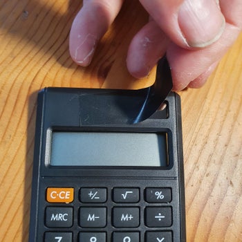 Remove Battery From Caculator