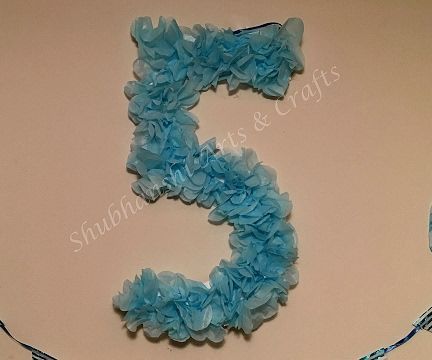 DIY guide for DIY Birthday Number Sign With Tissue Paper | Anna Elsa Frozen Birthday Party Decor with step-by-step instructions