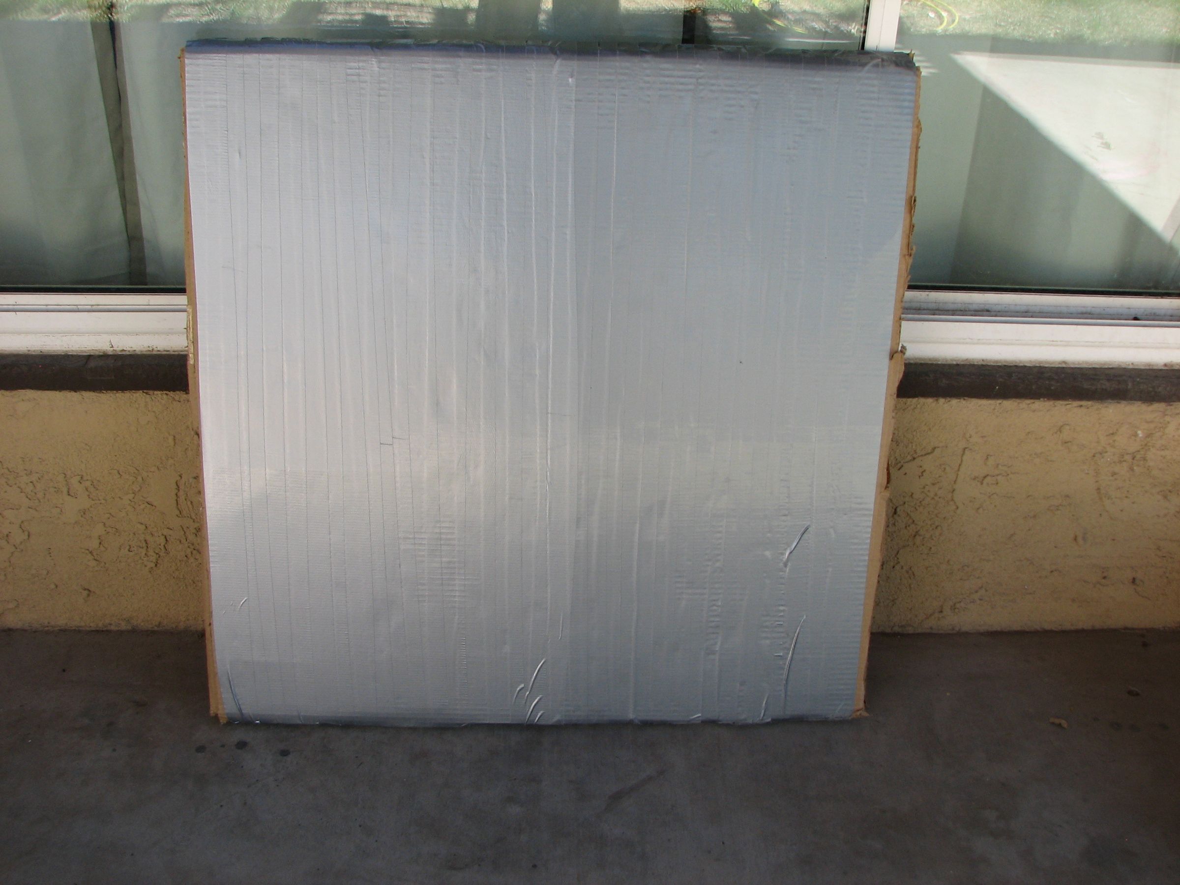 How to Make a Basic Archery Target Out of Cardboard and Duct Tape 5