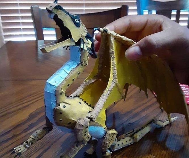 DIY guide for Cardboard Dragon (RainWing) With Moving Limbs, Tail, and Head With Water Spitting Teeth. with step-by-step instructions