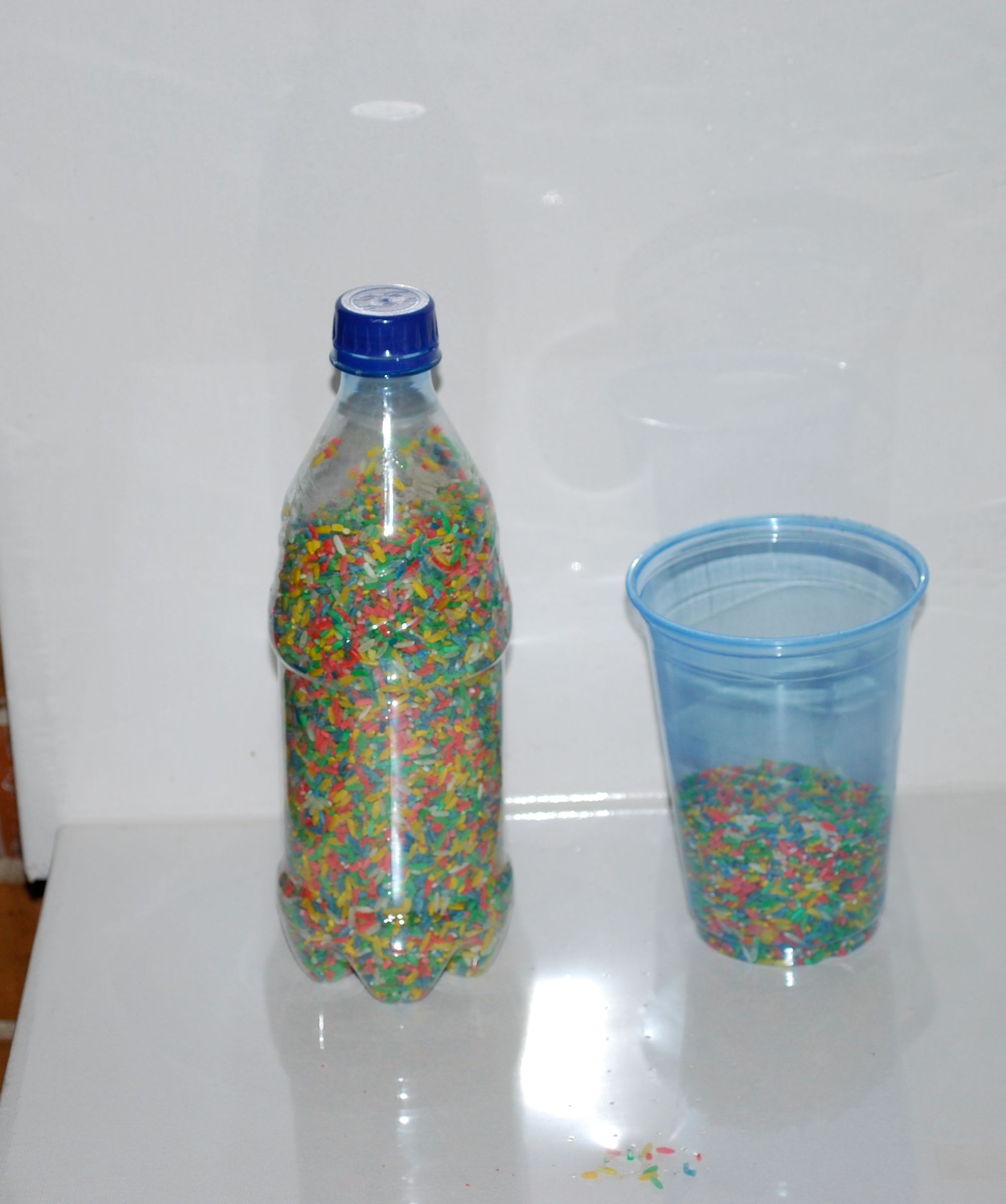 adding rice to bottle