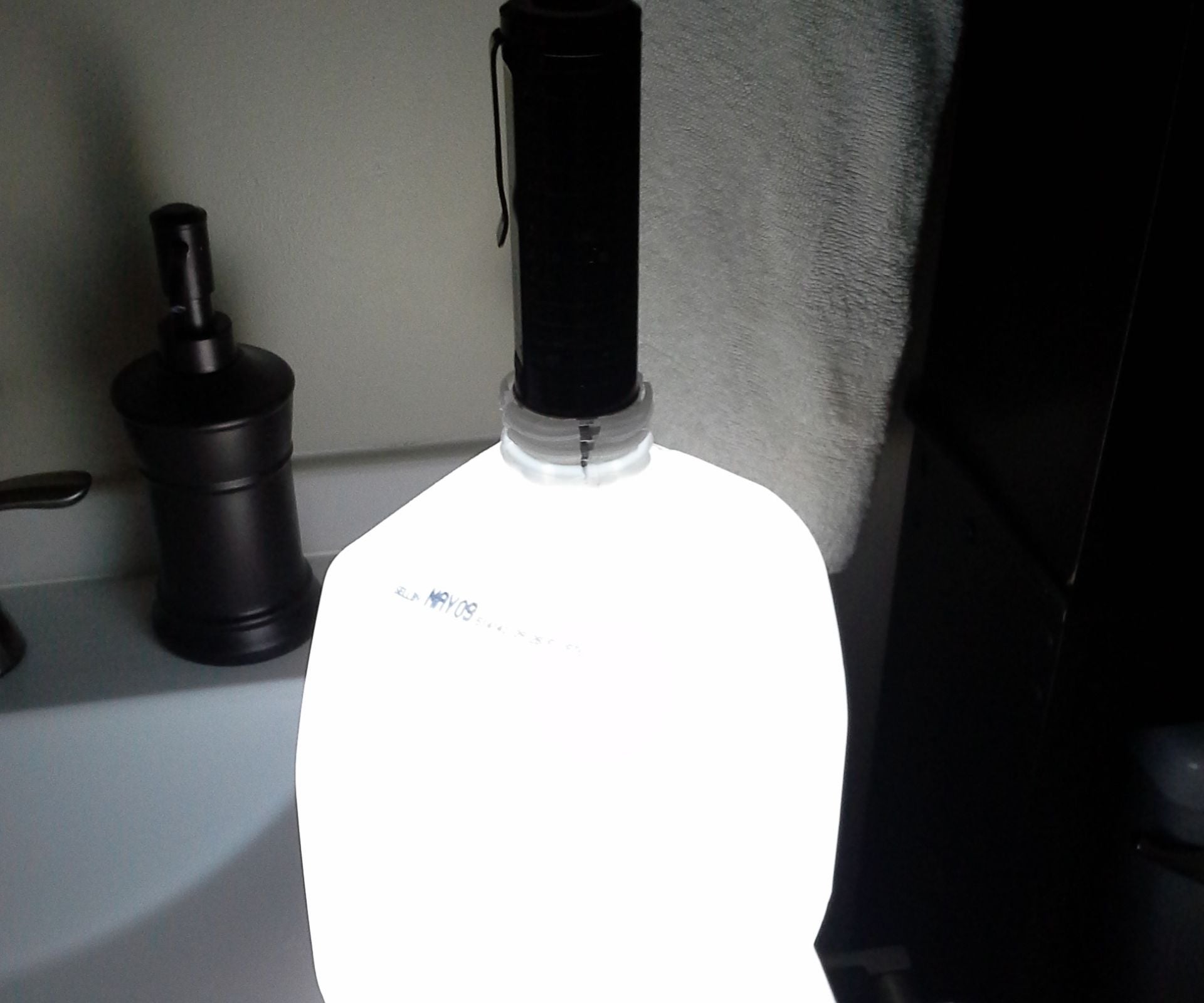 Make a Lantern Out of Your Flashlight and a Milk Jug. Call It the