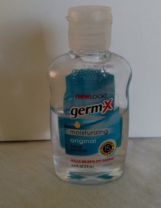 Removing sticky labels from plastic bottles