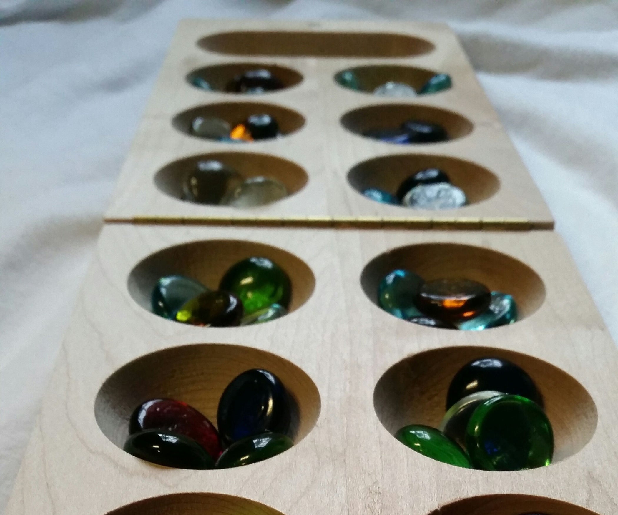 How to Play Mancala 5 Steps Instructables