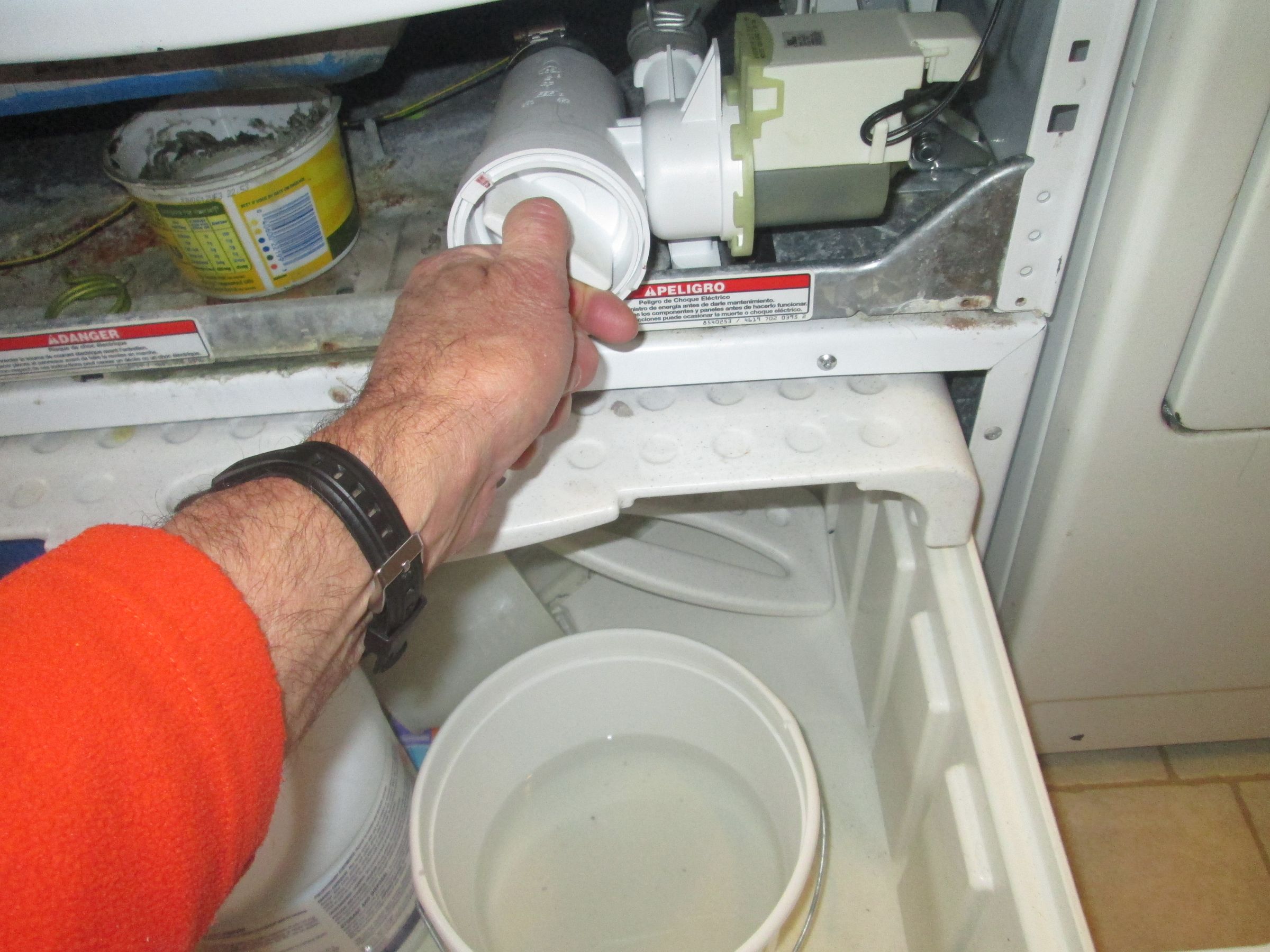 Replace a Drain Pump in a Kenmore / Whirlpool Washer 10 Steps