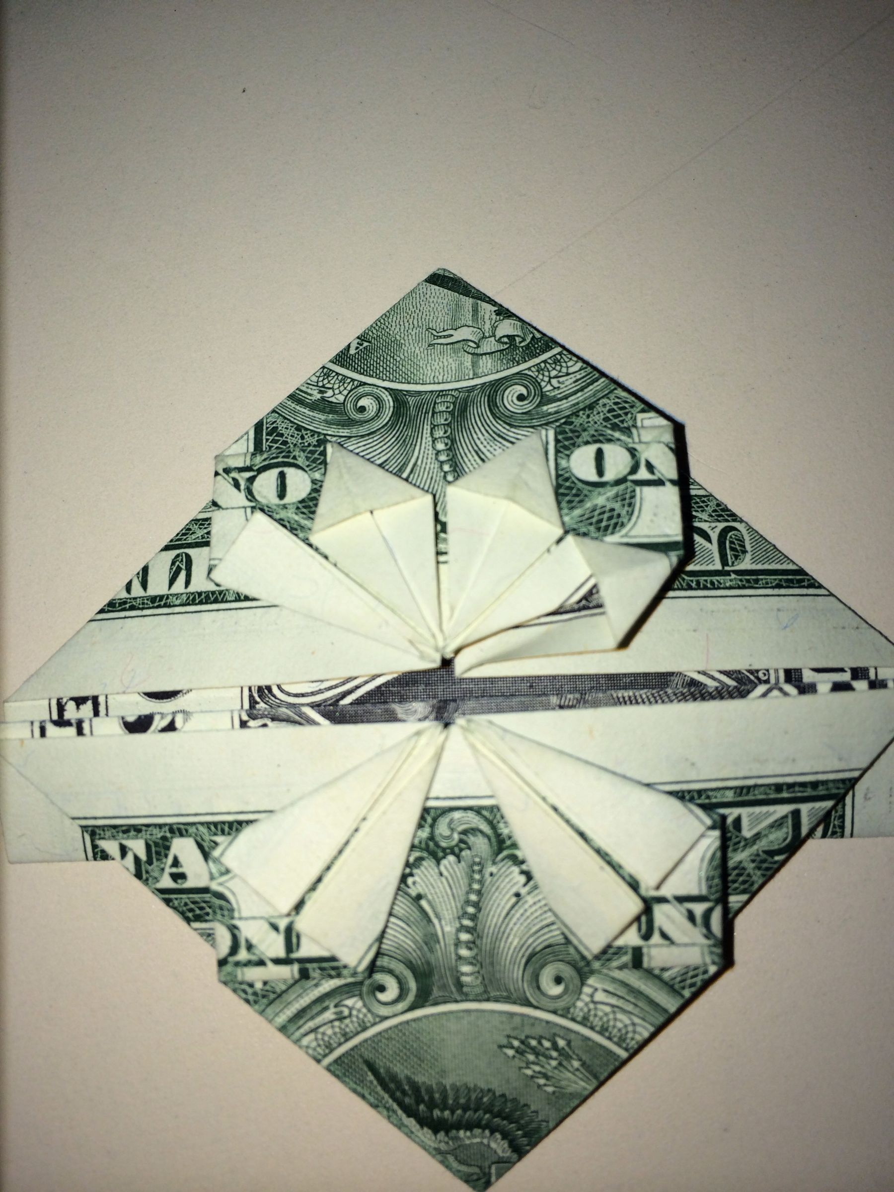 Dollar Origami Heart Holding Quarter 11 Steps Instructables