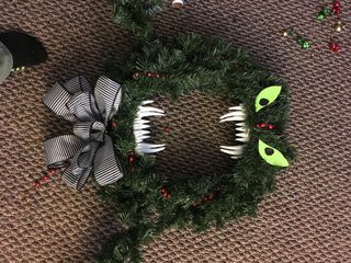 Christmas or Halloween? the Man Eating Wreath.