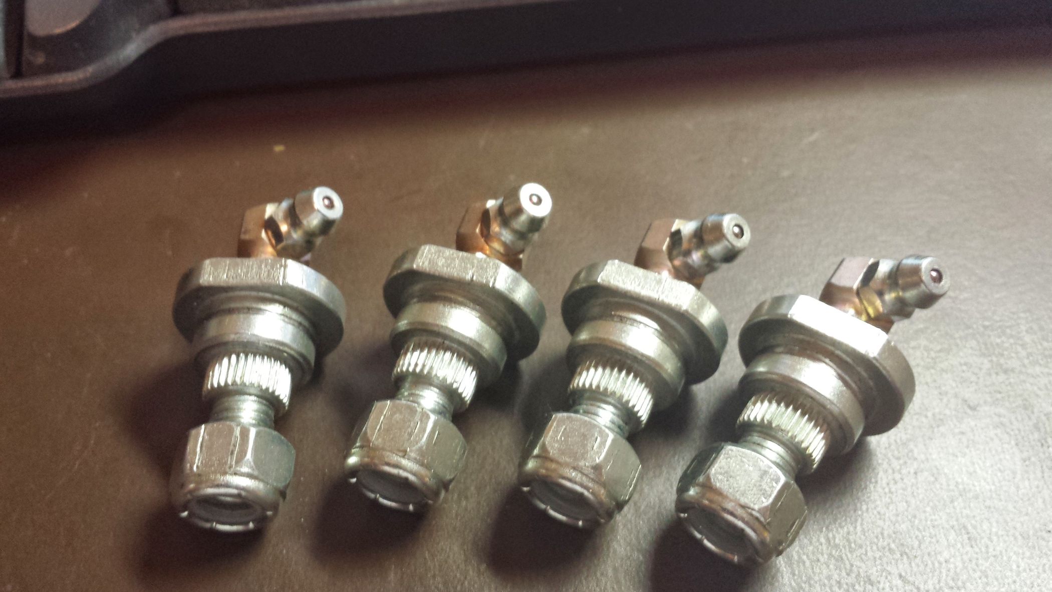 Modding Inexpensive Car Door Hinges Into Expensive Greasable Hinges 4