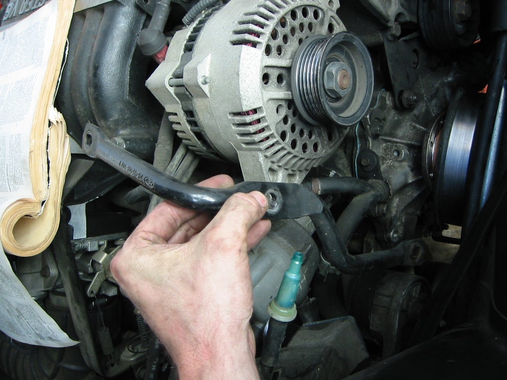 Installing a New Water Pump on a '95 Ford Taurus : 10 Steps ...