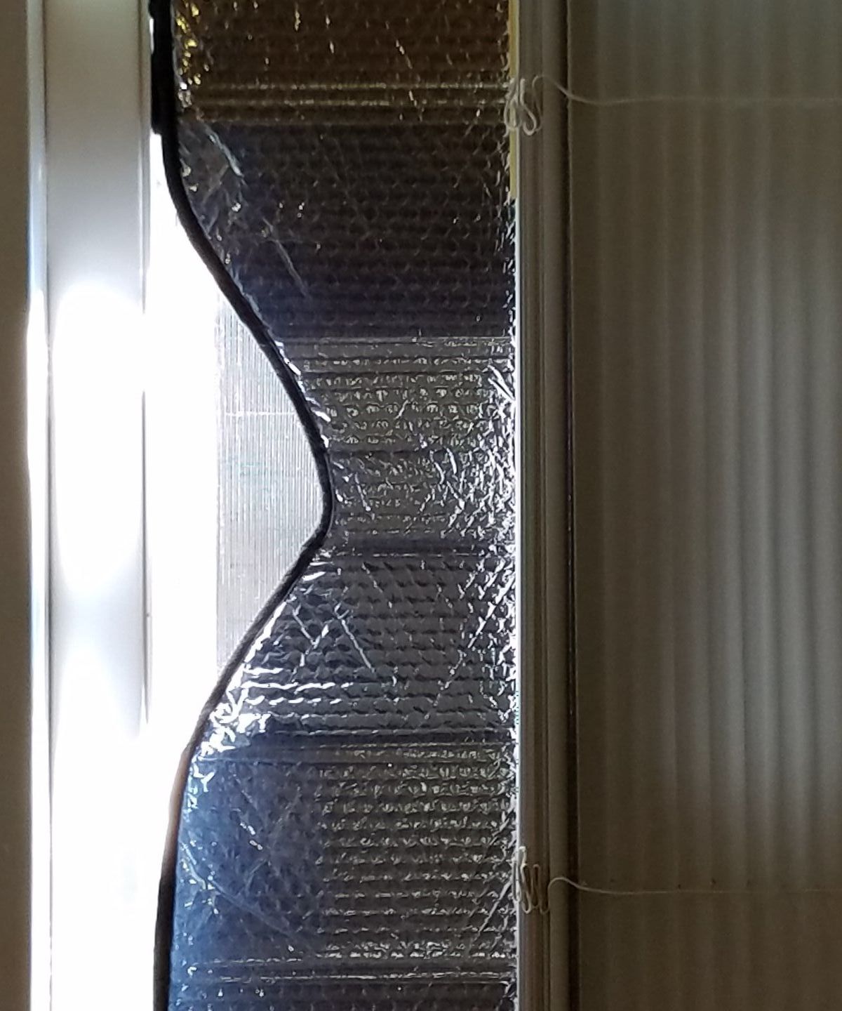 Adapting a Car Sun Shade for a Home Window