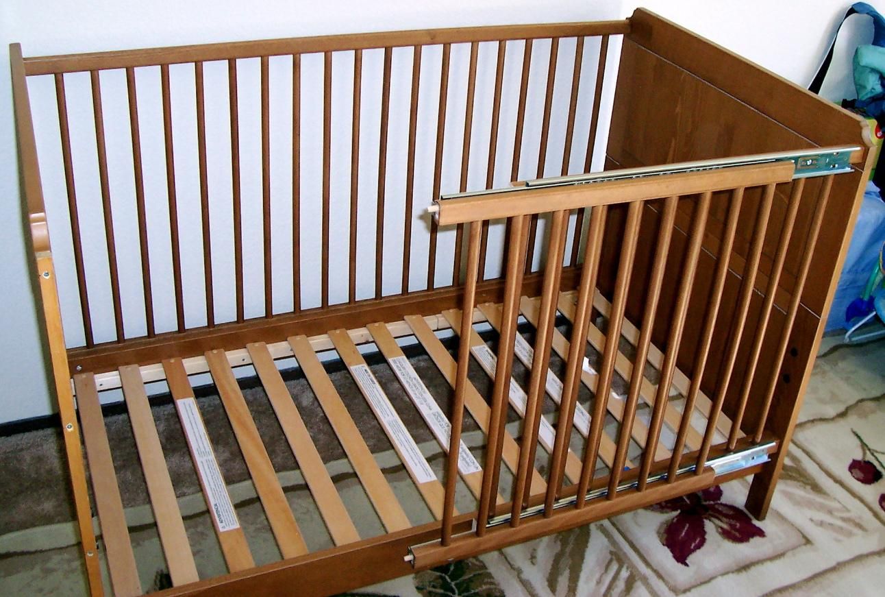 crib with fold down front