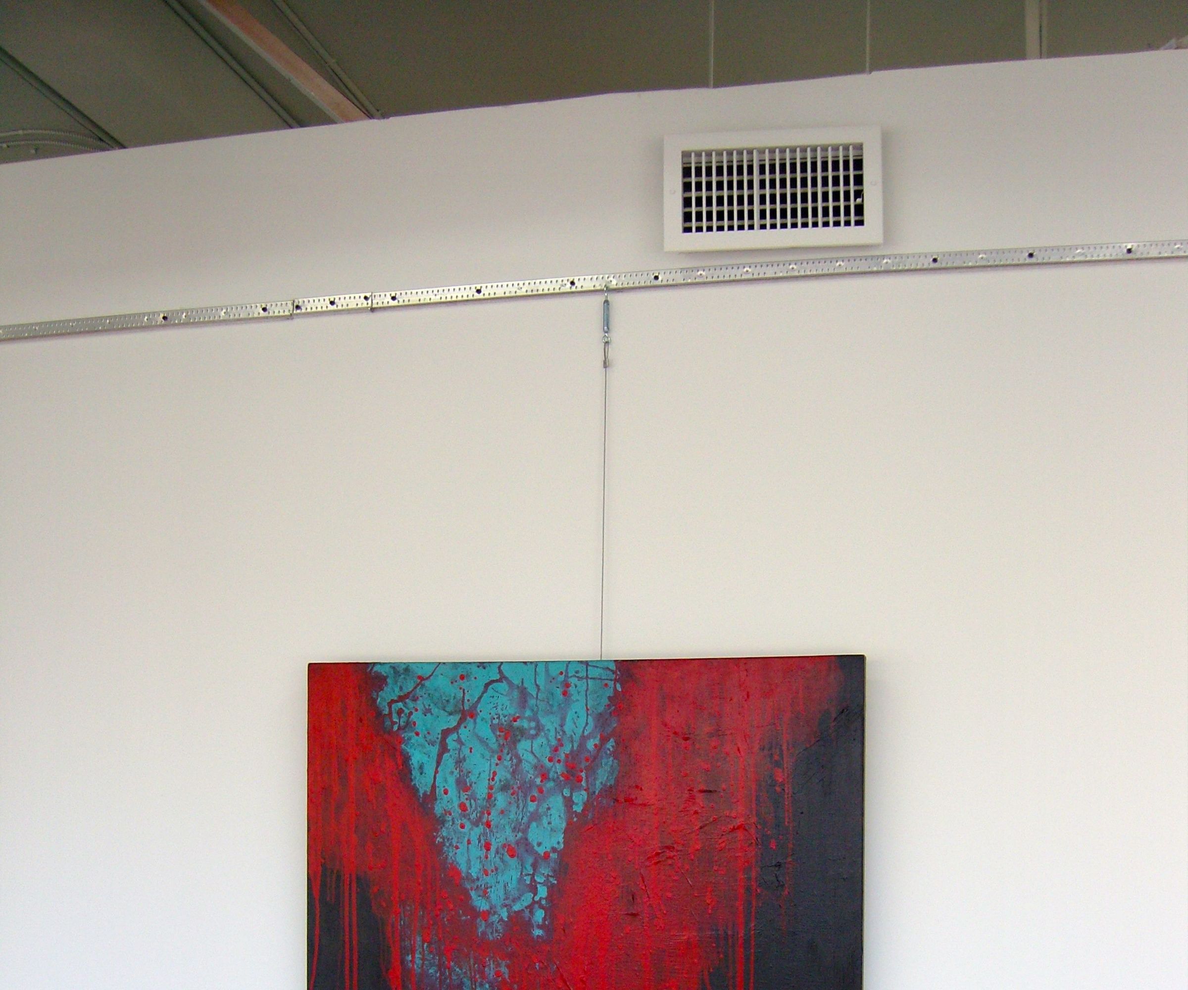 'No More Holes in the Wall' Art & Picture Hanging System