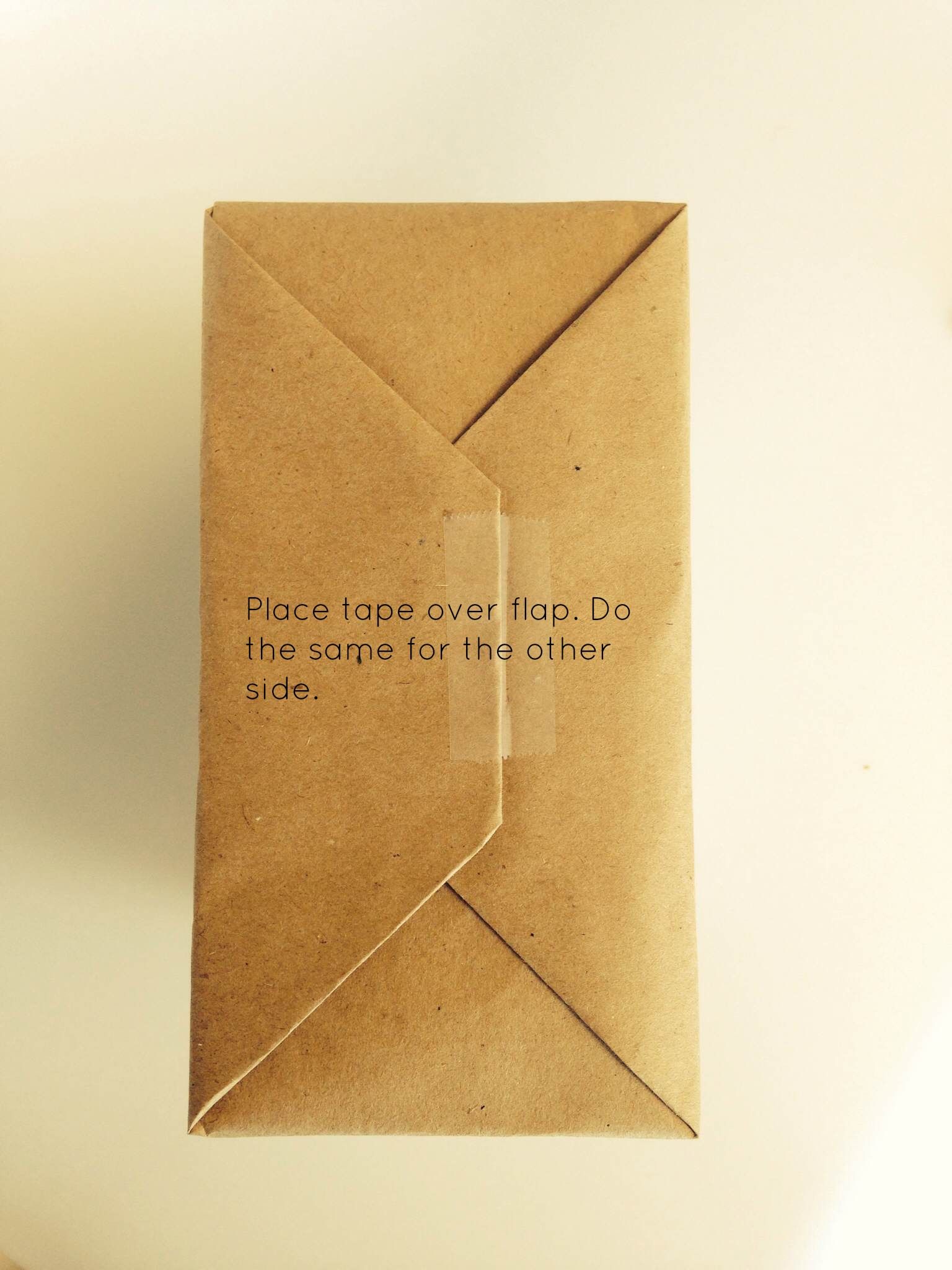 How to Gift Wrap (using 3 Pieces of Tape!) 7 Steps (with Pictures