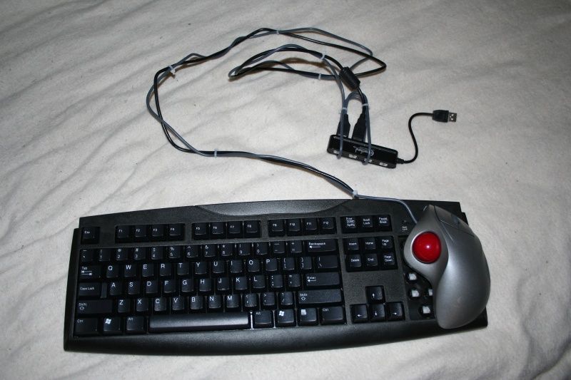 DIY guide for Make your own keyboard with integrated trackball mouse with step-by-step instructions