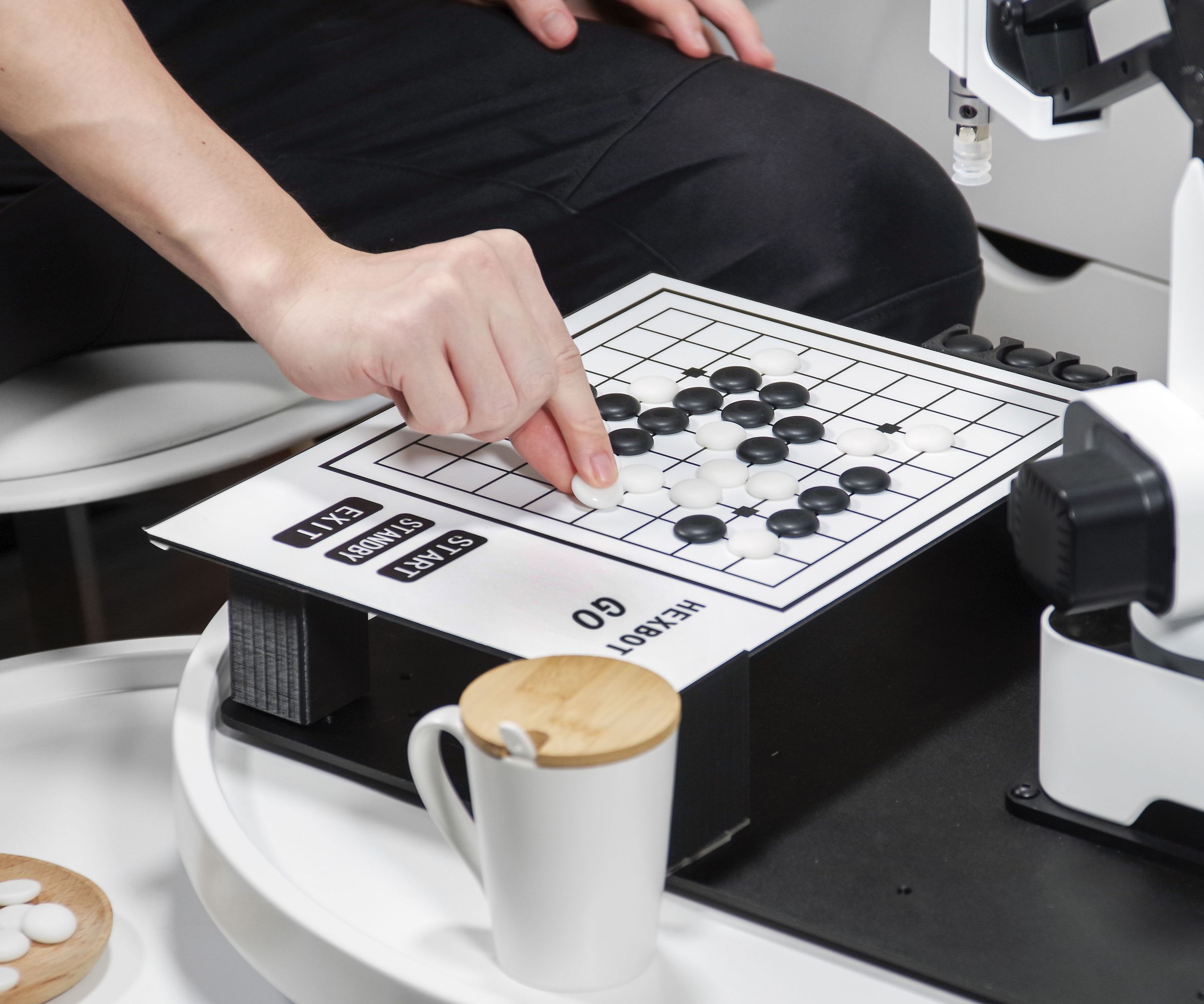 Build a Smart Gomoku Playing Robot with Hexbot