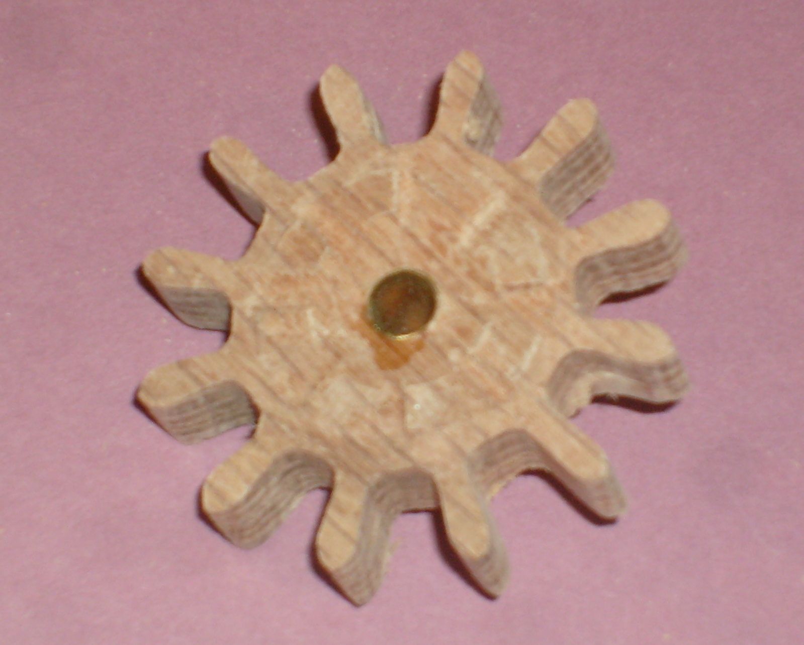 A Wood Gear Clock With a Unique Drive Mechanism 34 Steps (with