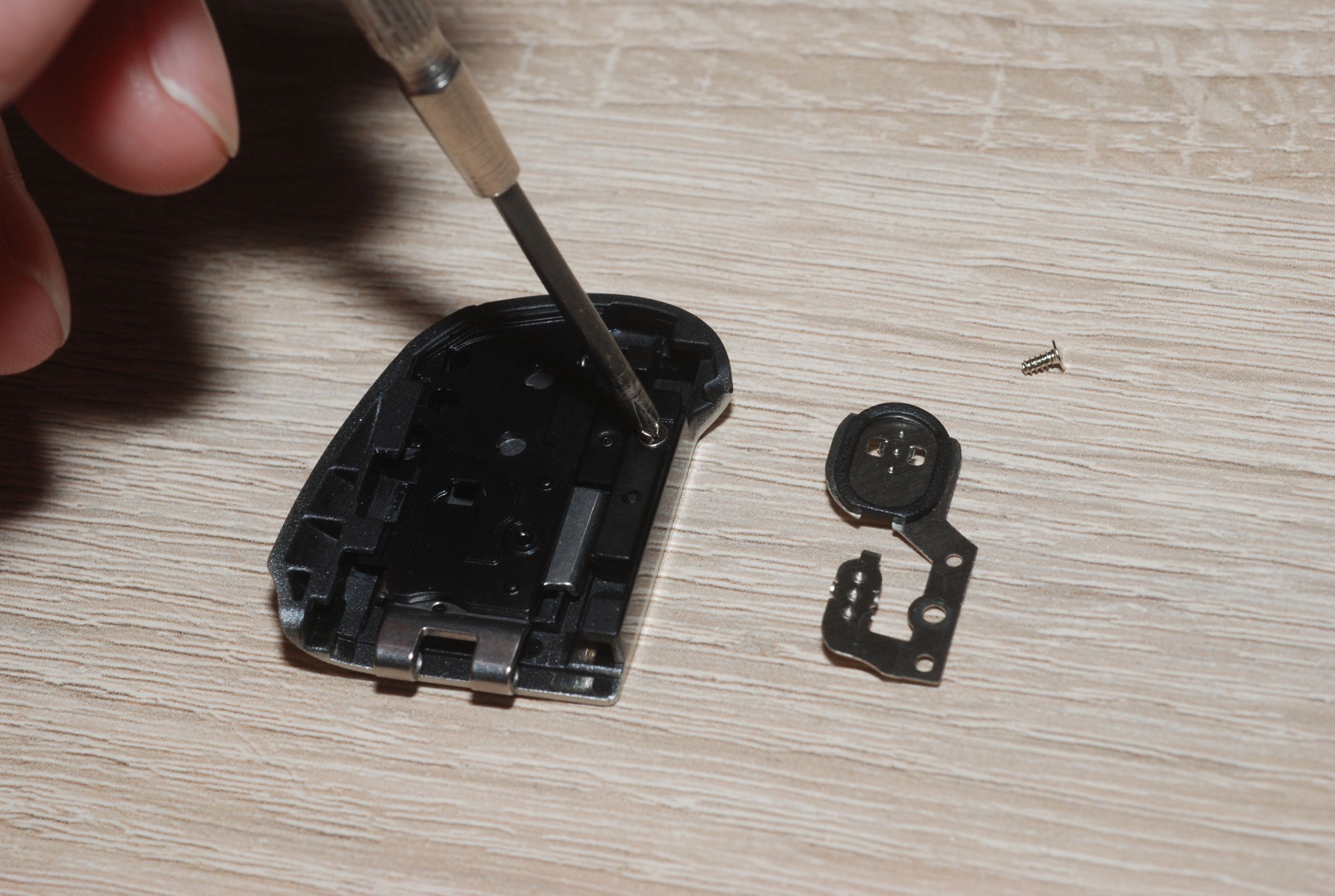 Replacement of Canon PowerShot SX130IS Battery Compartment Door 4