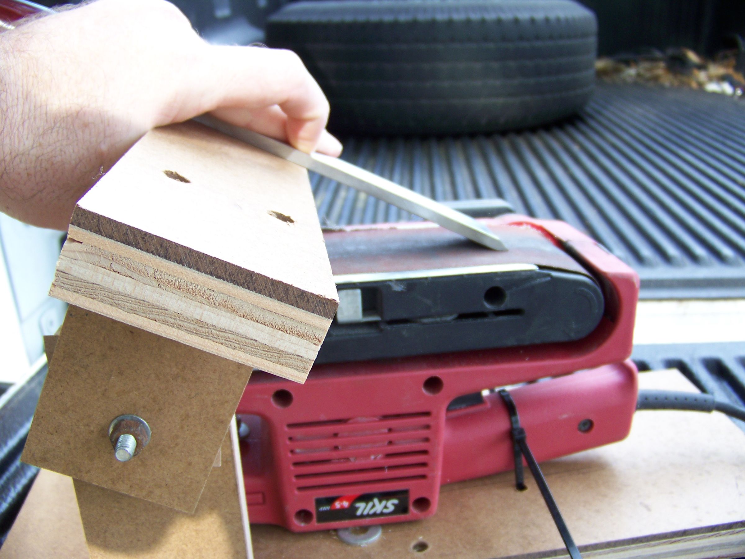 Tool Rest for a Belt Sander for Sharpening Instructables