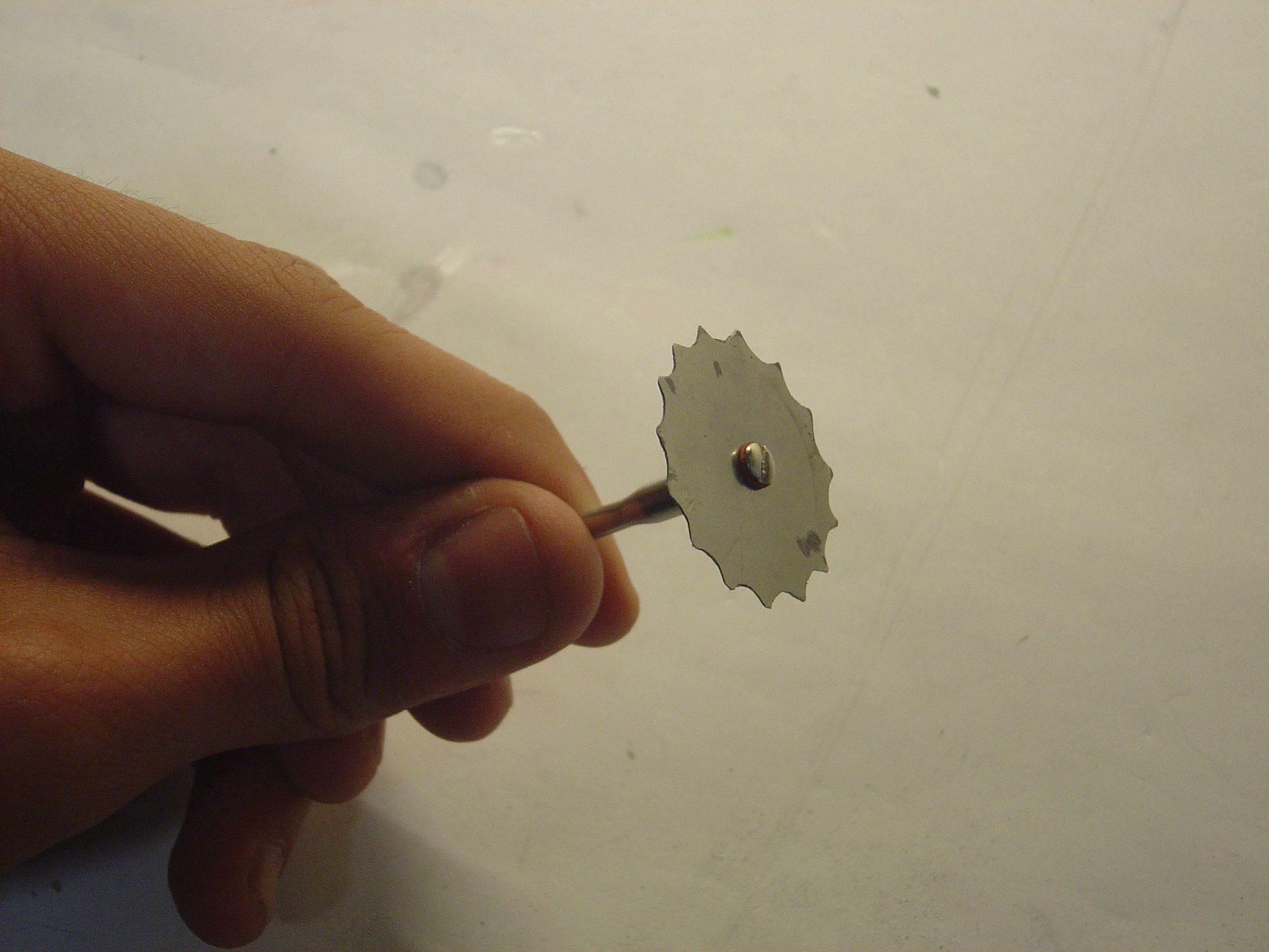 dremel saw bit from commercial button DIY Project DIY Project Image