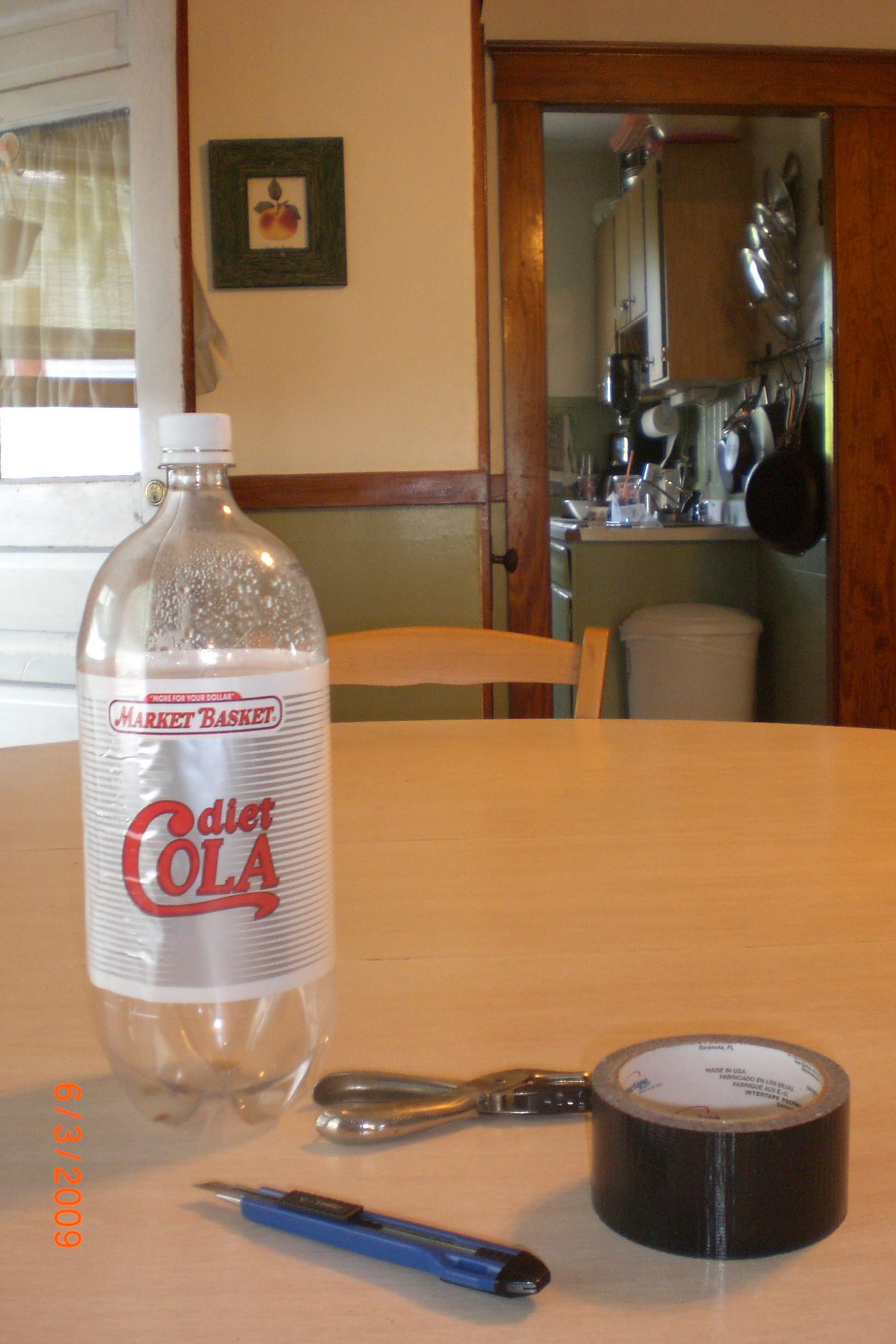 Slow Soaking Hanging Soda Bottle Planter 8 Steps Instructables